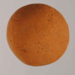 This clay ball found in Minoan ruins is possibly a marble.
