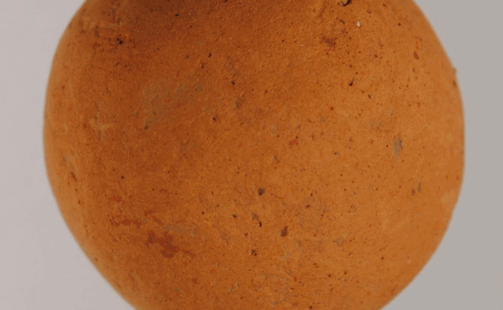 This clay ball found in Minoan ruins is possibly a marble.