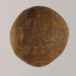 A second ball was found in Minoan ruins, but this one is made of a darker clay and is not so nicely made.